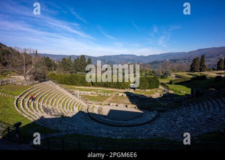 Roman theatre at Fiesole, originally an Etruscan town that overlooks the city of Florence - the bell tower a distinctive landmark on the hill. Stock Photo