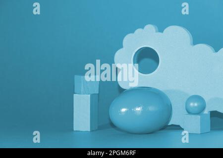 blue Easter egg design with geometric shape, futuristic technology design Stock Photo