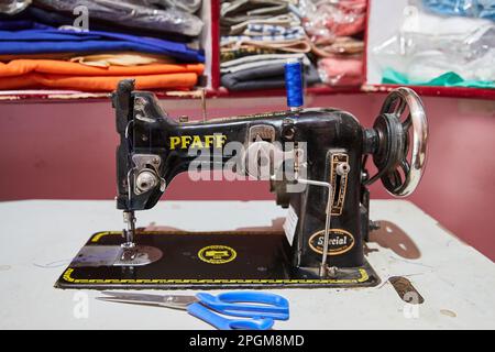 Delhi, India - old Pfaff sewing machine in a shop for turban fabric Stock Photo