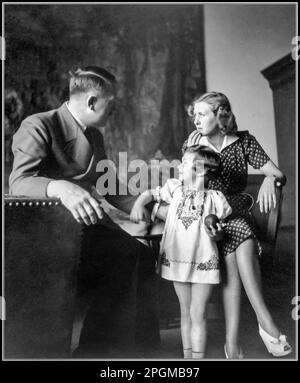 Adolf Hitler with his partner Eva Braun who is aunt to the little girl Ursula, photographed by Hertha Schneider, The Berghof Obersalzberg Nazi Germany 1942 The Photo Albums of Eva Braun Stock Photo
