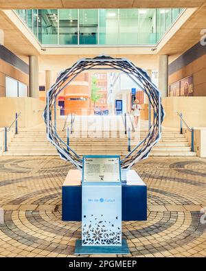 UAE, Abu Dhabi - 13th march, 2023: beautiful art statue by entrance to futuristic conceptional project - Masdar city in Abu Dhabi Stock Photo