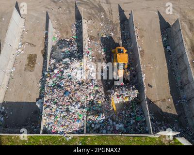 Landfill site, a pile of stinky different junk disposal in the concrete ...