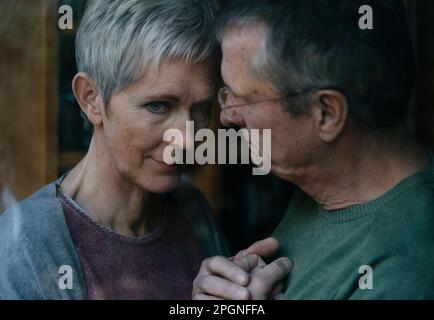 Senior man consoling sad wife Stock Photo
