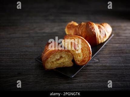 Studio shot of tray with fresh croissants Stock Photo