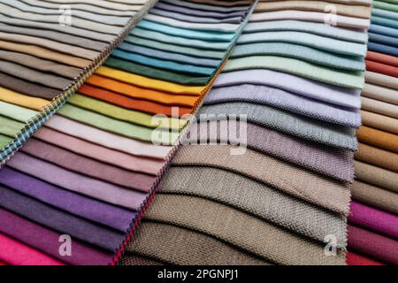 Multi colored fabric samples arranged in row Stock Photo