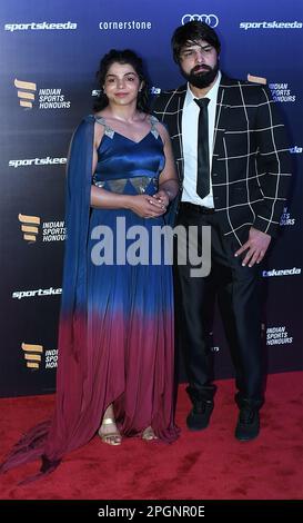 Mumbai, India. 23rd Mar, 2023. L-R Indian wrestler Sakshi Malik and her husband Satyawart Kadian pose for a photo during the Indian Sports Honours red carpet in Mumbai. The award aims to reward excellence in various sports and nurture upcoming talents. Credit: SOPA Images Limited/Alamy Live News Stock Photo