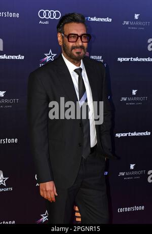 Mumbai, India. 23rd Mar, 2023. Bollywood actor Vishal Veeru Devgan, known professionally as Ajay Devgn poses for a photo during the Indian Sports Honours red carpet in Mumbai. The award aims to reward excellence in various sports and nurture upcoming talents. Credit: SOPA Images Limited/Alamy Live News Stock Photo