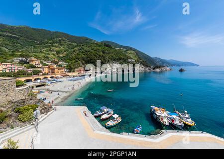 Italy, Liguria, Monterosso al Mare, Edge of coastal town along Cinque Terre in summer Stock Photo