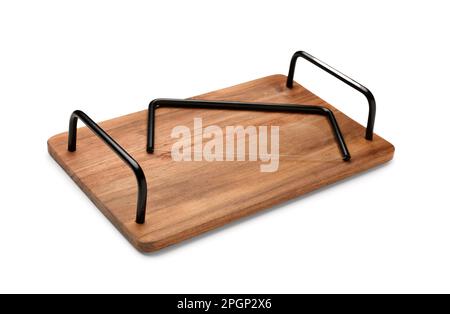 Wooden kitchen board with cheese slicer on white background Stock Photo