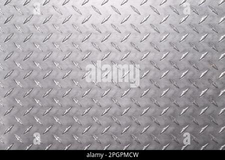 metallic surface with diamond pattern. steel or aluminum sheet, metal background Stock Photo