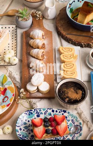 Peruvian desserts buffet table brunch sweet food Stock Photo