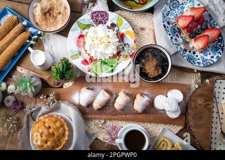 Peruvian desserts buffet table brunch sweet food Stock Photo