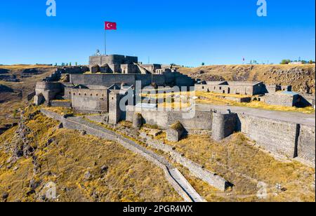 Kars, Turkey - October 25, 2022: Castle of Kars (Turkish: Kars Kalesi) view with blue sky. Castle is a former fortification located in Kars, Turkey. B Stock Photo