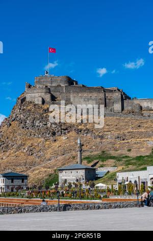 Kars, Turkey - October 25, 2022: Castle of Kars (Turkish: Kars Kalesi) view with blue sky. Castle is a former fortification located in Kars, Turkey. Stock Photo