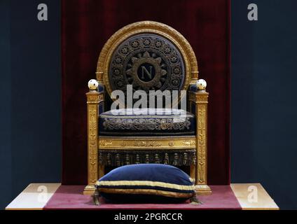 Paris, France. 22nd Mar, 2023. This photo taken on March 22, 2023 shows the throne of Napoleon I displayed at the Louvre Museum in Paris, France. The Louvre, formerly a royal residence, became a museum in 1793 during the French Revolution. Credit: Gao Jing/Xinhua/Alamy Live News Stock Photo