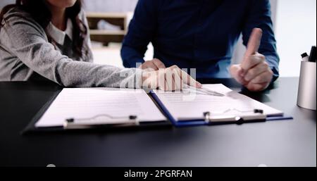 Lawyer Hand Document Review And Contract Mediation Stock Photo