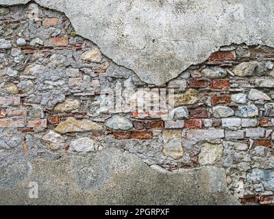 Surface of decayed stone wall as background Stock Photo