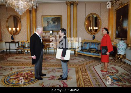 RETRANSMITTING CORRECTING NAME OF AMBASSADOR King Charles III receives the Ambassador of Turkey Koray Ertas, with his wife Sevcan Ertas, as he presents his credentials during a private audience at Buckingham Palace, London. Picture date: Thursday March 23, 2023. Stock Photo