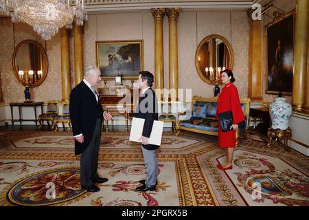 RETRANSMITTING CORRECTING NAME OF AMBASSADOR King Charles III receives the Ambassador of Turkey Koray Ertas, with his wife Sevcan Ertas, as he presents his credentials during a private audience at Buckingham Palace, London. Picture date: Thursday March 23, 2023. Stock Photo