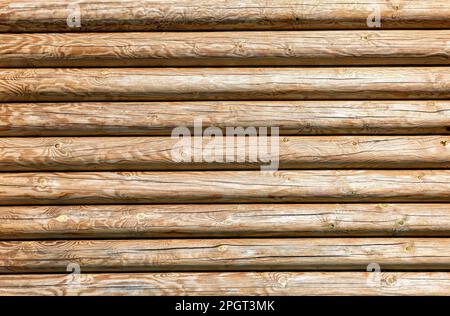 Creative background of wooden logs with natural pattern Stock Photo
