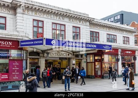 Entrance to Farringdon Underground station, the old 'Metropolitan Railway' sign visible above the modern awning, London, UK Stock Photo
