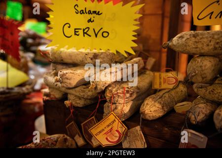 Deer salami (Salame di Cervo) is sold at Italian Christmas market. Stock Photo