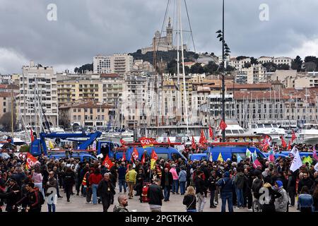 Marseille, France. 23rd Mar, 2023. Protesters are gathered on the Old Port of Marseille during the demonstration. At the call of several unions, thousands of people gathered in the Old Port of Marseille to protest against the pension reform wanted by the French government and which would lower the retirement age from 62 to 64 years old. Credit: SOPA Images Limited/Alamy Live News Stock Photo