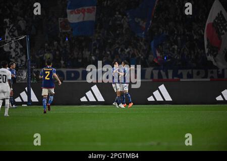 TOKYO, JAPAN - MARCH 24: Takuma Nishimura of Japan celebrates after scoring the team's first goal with Junya Ito of Japan during the International Friendly match between Japan and Uruguay at the National Stadium on March 24, 2023 in Tokyo, Japan (Photo by Pablo Morano/BSR Agency) Stock Photo