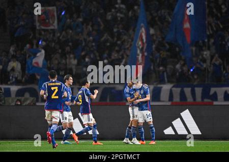 TOKYO, JAPAN - MARCH 24: Takuma Nishimura of Japan celebrates after scoring the team's first goal with Junya Ito of Japan during the International Friendly match between Japan and Uruguay at the National Stadium on March 24, 2023 in Tokyo, Japan (Photo by Pablo Morano/BSR Agency) Stock Photo