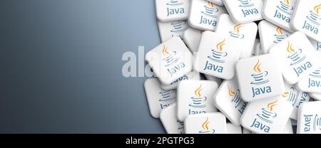 Logos of the programming language C++ on a heap on a table. Web banner ...