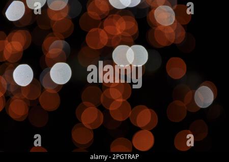 Bokeh Photography of orange Lights. Orange and White Bokeh Lights. Stock Photo