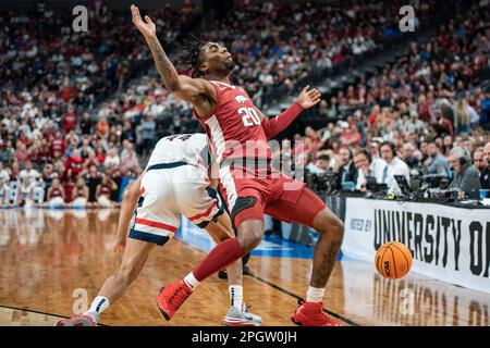 Connecticut Huskies guard Andre Jackson Jr. (44) fights for a loose ball with Arkansas Razorbacks forward Kamani Johnson (20) during a NCAA men’s bask Stock Photo