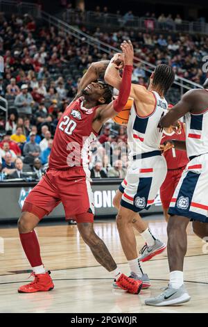 Connecticut Huskies guard Andre Jackson Jr. (44) fights for a rebound with Arkansas Razorbacks forward Kamani Johnson (20) during a NCAA men’s basketb Stock Photo