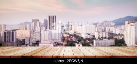 Wood table top on white bokeh blurred city sunset background building hallway for display montage mock up products Blurred dark night city background Stock Photo