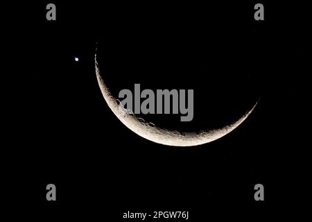 Kuala Lumpur, Kuala Lumpur, Malaysia. 24th Mar, 2023. The crescent moon and Venus are pictured in Kuala Lumpur on March 24, 2023, following a lunar occultation of the second planet from the sun (Credit Image: © Mohd Daud/ZUMA Press Wire) EDITORIAL USAGE ONLY! Not for Commercial USAGE! Stock Photo