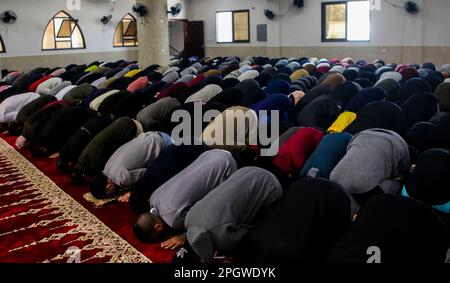 Rafah, Gaza Strip, Palestine. 24th Mar, 2023. Gaza, Palestine. 24 March 2023. Palestinians perform the first Friday prayer of Ramadan (Credit Image: © Ahmad Hasaballah/IMAGESLIVE via ZUMA Press Wire) EDITORIAL USAGE ONLY! Not for Commercial USAGE! Stock Photo