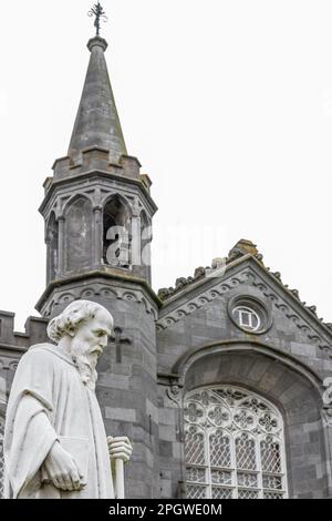 statue of Saint Canice in front of Saint Canice's Catholic Church, Kilkenny, province of Leinster, Ireland, Europe Stock Photo