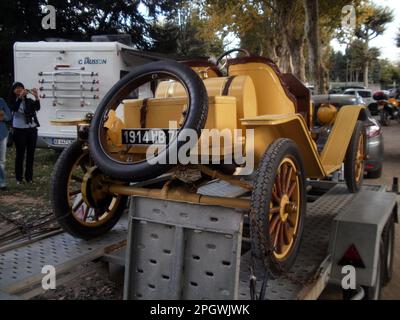 Aix-les-bains, France - August 29th 2010 : Yellow 1914 Mitchell Speedster exhibed in a public park. Stock Photo