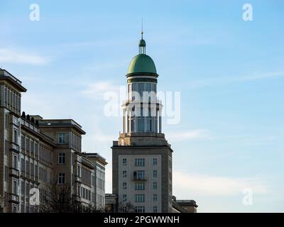 Tower at the Frankfurter Tor (Frankfurt Gate) in Berlin Friedrichshain. Architecture in front of a blue sky. Beautiful building exterior in the east. Stock Photo