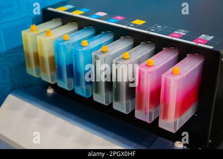 Row of inkjet printer CMYK cartridges - close up Stock Photo