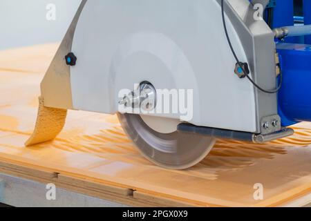 Automatic cnc bridge saw - router profiling system cutting artificial stone Stock Photo