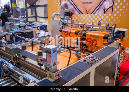 Fully automatic high speed shopping bag making machine at exhibition Stock Photo