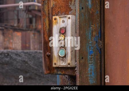 A Relic Control Panel of an industrial, no longer working elevator in the industrial area of Dolni Vitkovice in the Czech city of Ostrava. Stock Photo