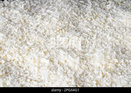 Couscous bowl, typical Brazilian dish, made with tapioca, milk, sugar and coconut milk. Close view. Stock Photo