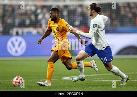 SAINT-DENIS - (lr) Georginio Wijnaldum of Holland, Adrien Rabiot of France during the UEFA EURO 2024 qualifying match between France and Netherlands at Stade de France on March 24, 2023 in Saint-Denis, France. ANP MAURICE VAN STONE Stock Photo