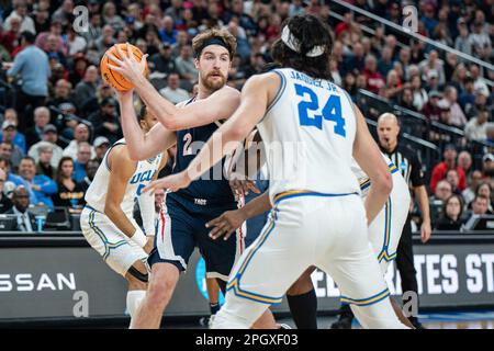 Gonzaga Bulldogs forward Drew Timme (2) is guarded by UCLA Bruins guard Jaime Jaquez Jr. (24) during a NCAA men’s basketball tournament game, Monday, Stock Photo