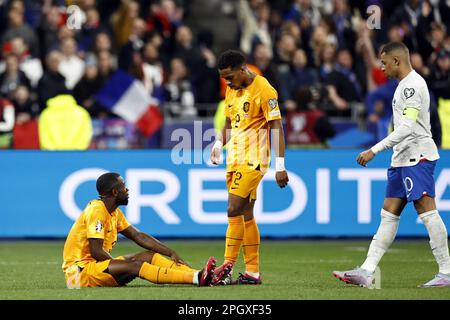 SAINT-DENIS - Lutsharel Geertruida of Holland, Jurrien Timber of Holland, Kylian Mbappe of France during the UEFA EURO 2024 qualifying match between France and Netherlands at Stade de France on March 24, 2023 in Saint-Denis, France. ANP MAURICE VAN STONE Stock Photo