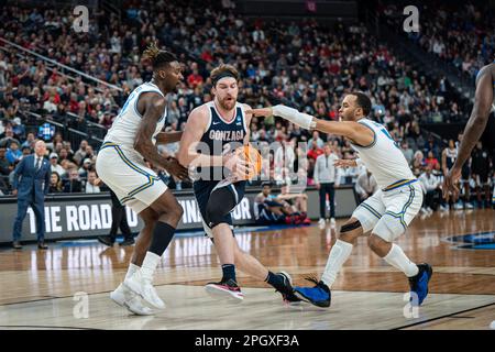 Gonzaga Bulldogs forward Drew Timme (2) is guarded by UCLA Bruins forward Kenneth Nwuba (14) and guard Amari Bailey (5) during a NCAA men’s basketball Stock Photo