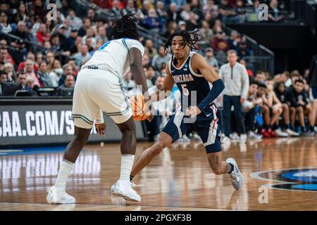 UCLA Bruins Guard Will McClendon 4 Shoots Over LIU Sharks Guard Tai   Gonzaga Bulldogs Guard Hunter Sallis 5 Drives Against Ucla Bruins Guard Will Mcclendon 4 During A Ncaa Mens Basketball Tournament Game Monday M 2pgxf3b 