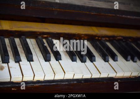 An old piano sits in an abandoned church building in rural Missouri, MO, United States, US, USA. Stock Photo
